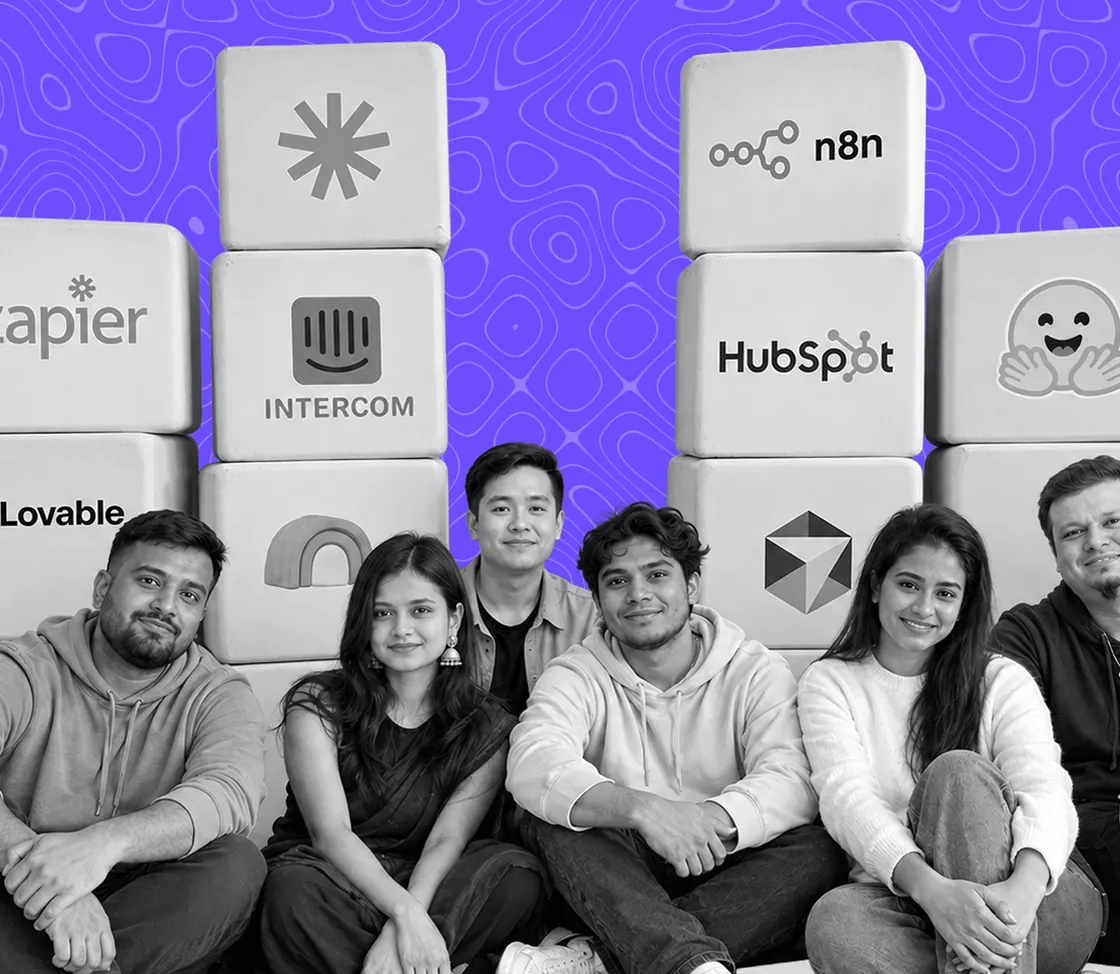 A team seated in front of the software tools they work with
